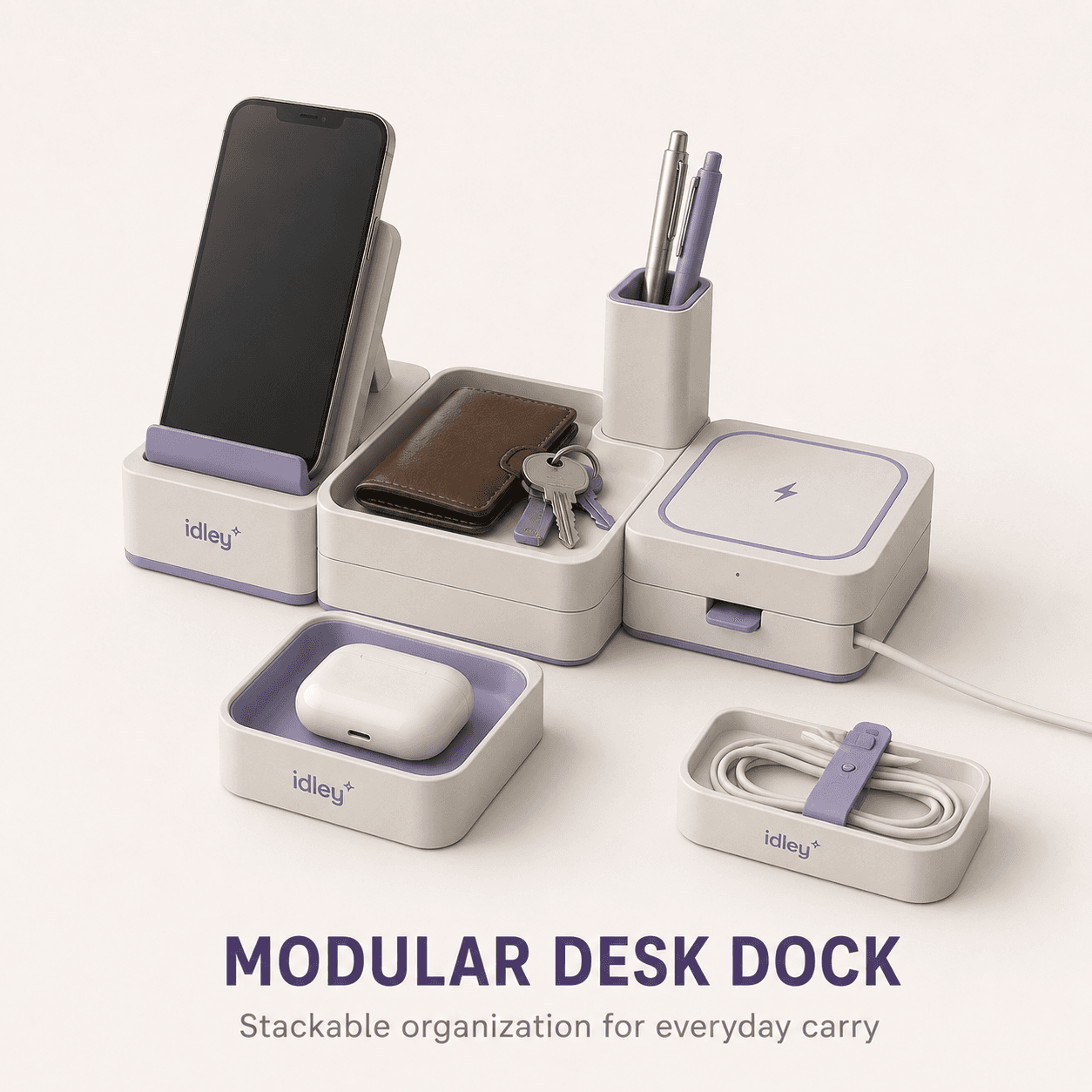 Modular desk dock for phone, earbuds, cable, keys, pens, and wallet.
